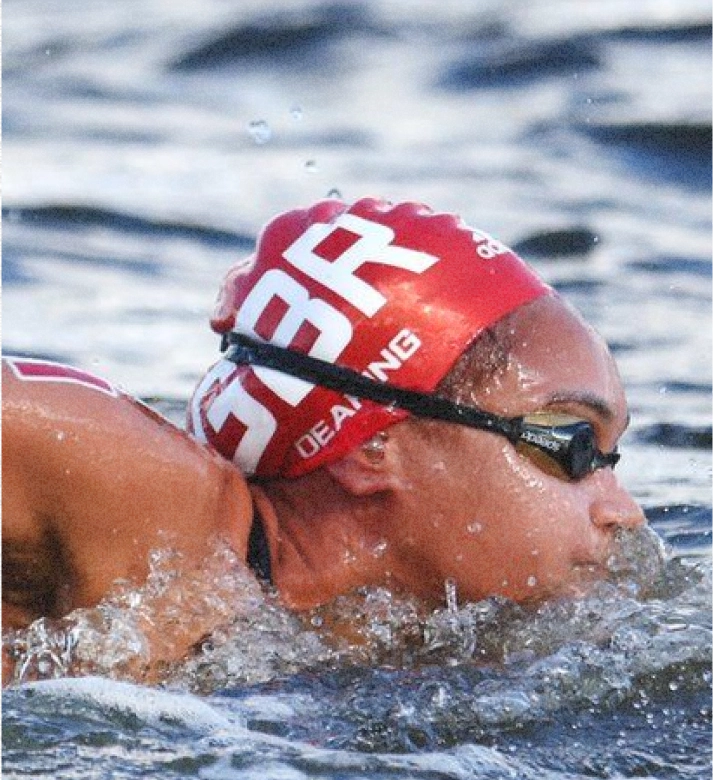 Alice Dearing competes in the water